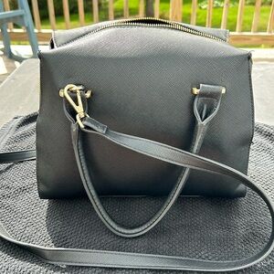 Black pocketbook by A New Day